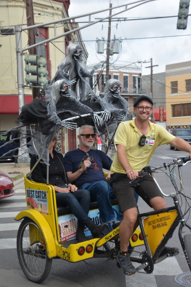 Like most New Orleanians, pedicab drivers are a fun loving bunch. (Photo courtesy Flickr user John Rigney.)