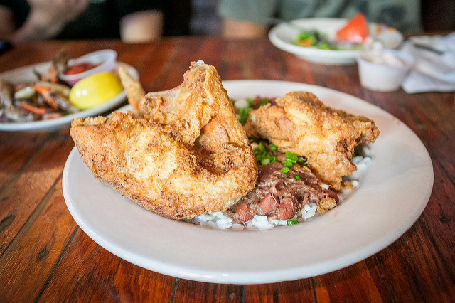 Coop's Place serves up Cajun Fried Chicken with Rabbit & Sausage Jambalaya. (Photo via Flickr user City Foodsters)