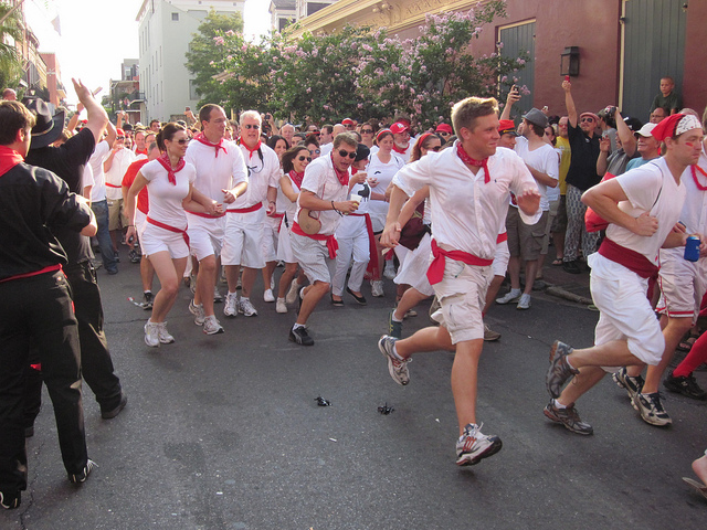 To mimic the original Spanish festival, runners at San Fermin in Nueva Orleans are required to wear white and red. (Photo courtesy Infrogmation)