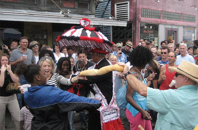 A Po-Boy Limbo Taking Place at Oak Street Po Boy Festival (Photo: Infrogmation)