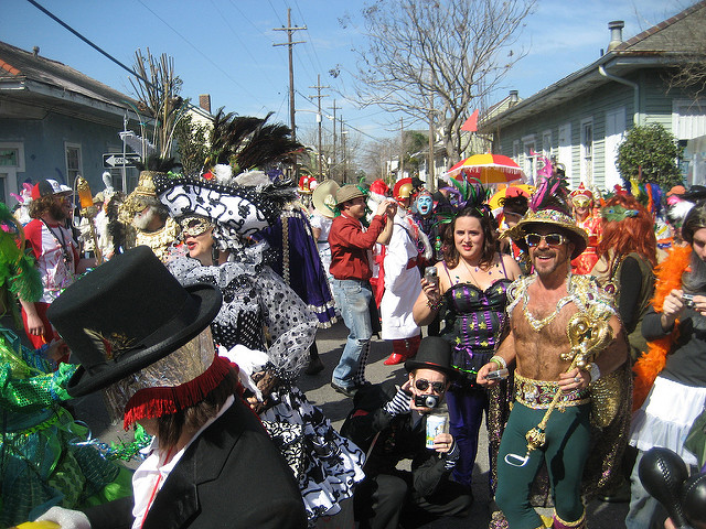 Members of the Society of St. Anne wear elaborate costumes to parade on Mardi Gras morning in the Bywater neighborhood of New Orleans.(Photo courtesy Flickr user Infrogmation)